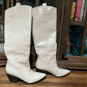 Princess Polly tall cowboy boots in the color Ecru